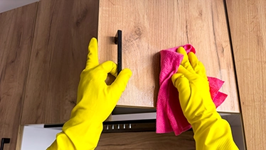 Cleaning cabinets.