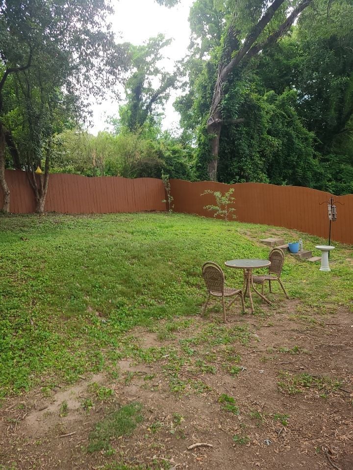 Brown solid stain on an older fence
