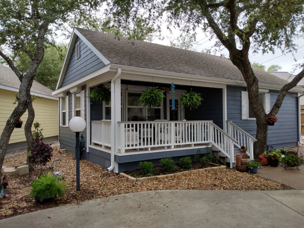 Cottage Home in Rockport Sherwin Williams SW7665 Wall Street body with Extra White Trim