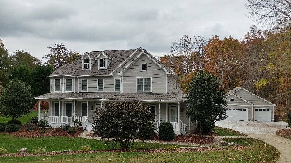 Full exterior repaint with color change from off white to gray