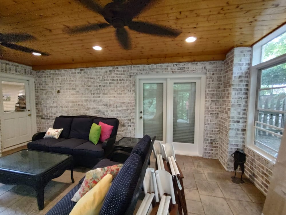 Lime washed basement brick wall
