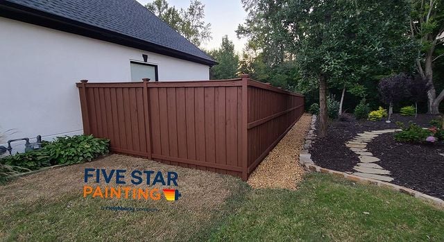 Painted fence in back yard