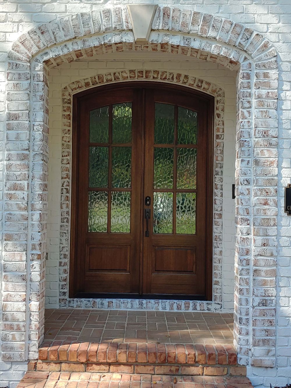 Re-finish front doors and frame