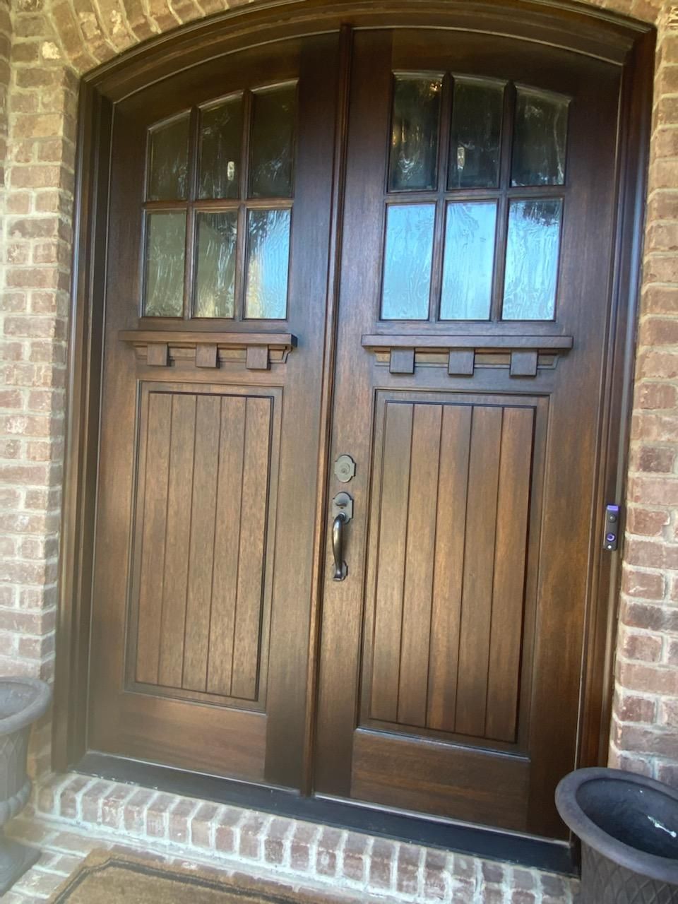 Re-stain wood front doors and frame