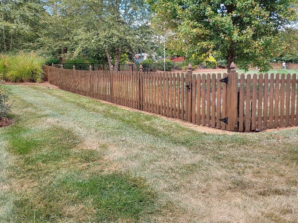 Re-staining a picket fence