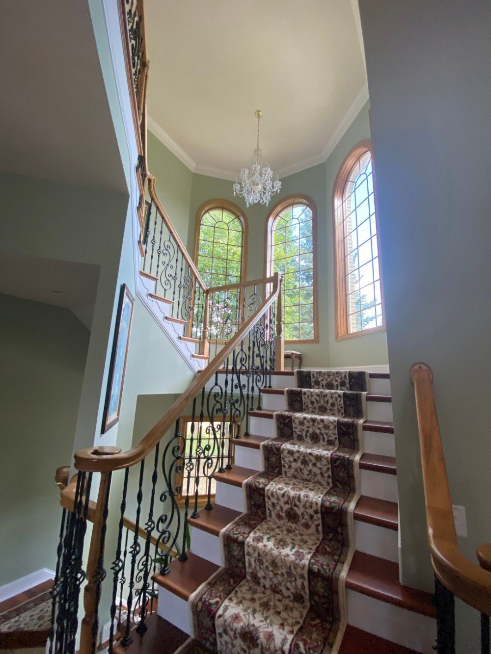 Stairwell with tall windows