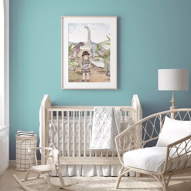 blue room with crib in it