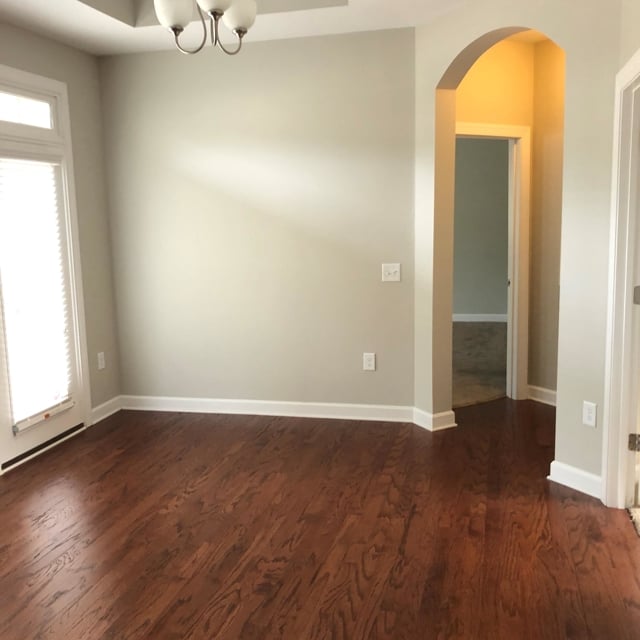 Cream walls white accents hardwood floor SW Seafoam Green house We services Raleigh, Durham, Chapel Hill, Wake Forest, Brier Creek, Hillsbourough, Pittsboro, Rolesville with Sherwin Williams, Ben Moore paints for Interior, Exterior, cabinets, Decks, & commerical