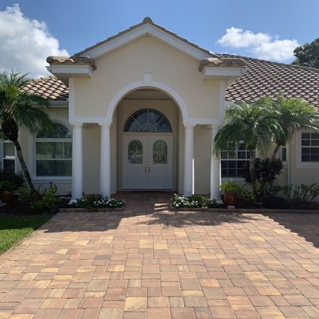 yellow house with white trim 