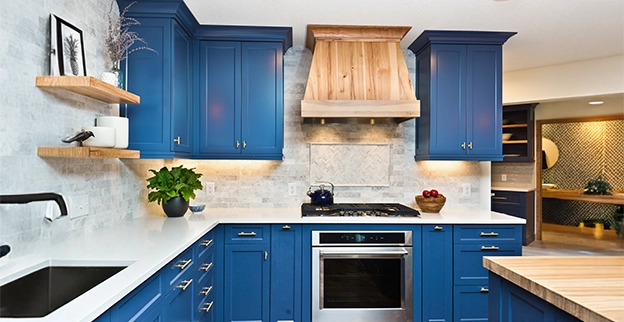 Blue painted kitchen cabinets.