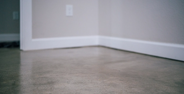 Close up image of a stained concrete floor.