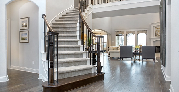 White staircase inside a home.