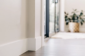 Close up view of white trim inside a home.