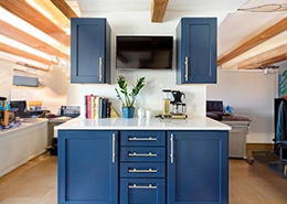 Blue kitchen cabinets.