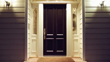 Solid door in well lit entryway