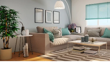 A living room with blue, white, and turquoise accents