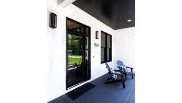 Modern house porch exterior with white painted brick.