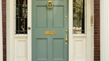 Nice front entrance with blue door.