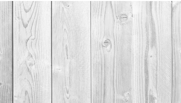 Photo of a weathered whitewashed wooden deck