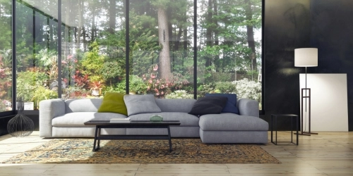 Large Open Living Space with Gray Sofa and Large Windows Large Open Living Space with Gray Sofa and Large Windows