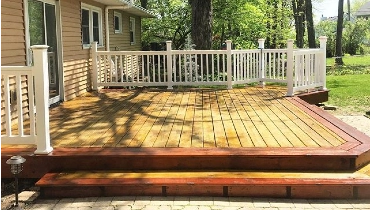 Wood deck and white handrail