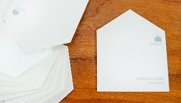 White envelopes on wooden surface