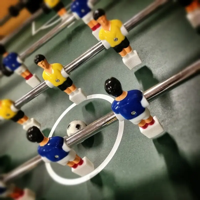 Close-up of table soccer figurines.